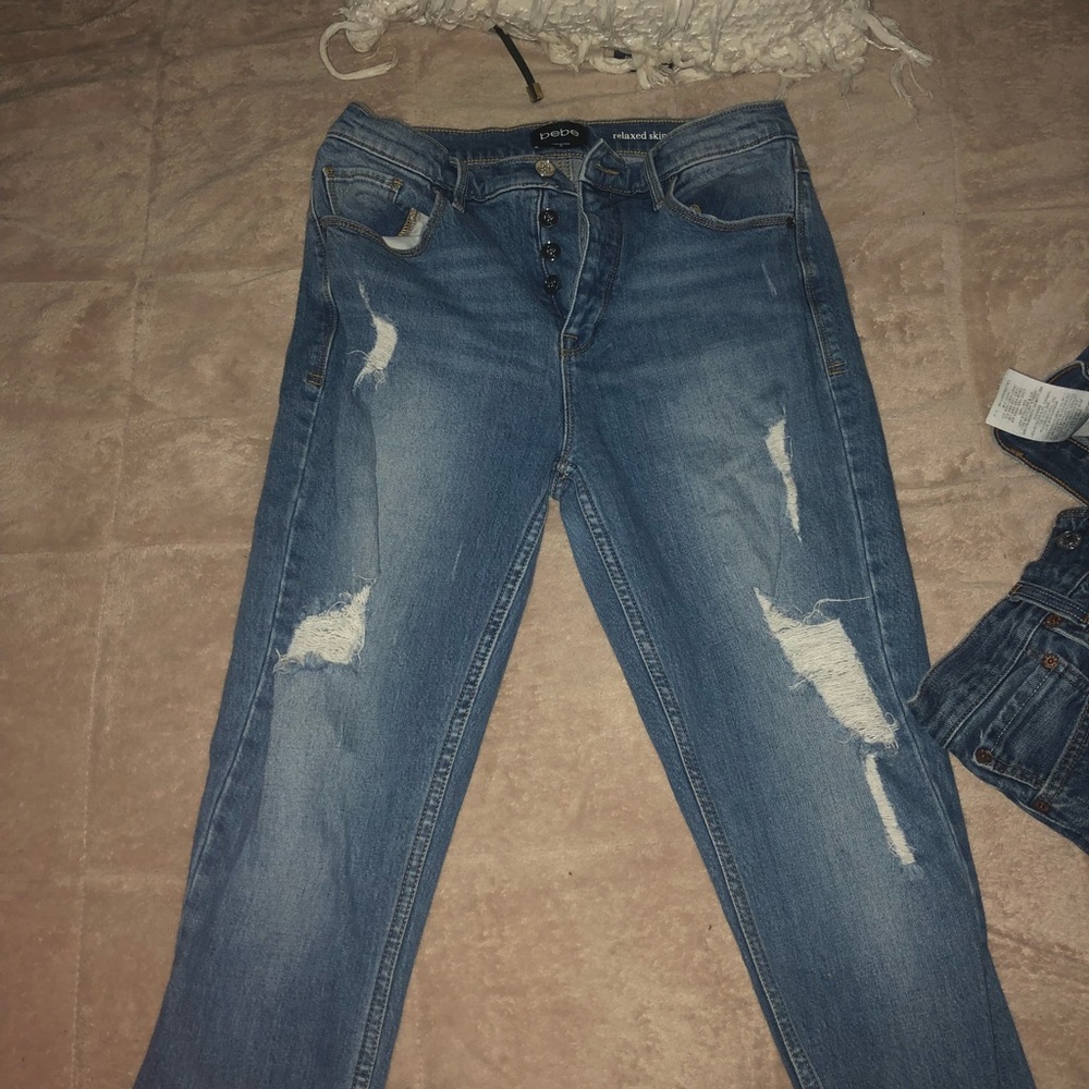 Three buttoned Bebe jeans